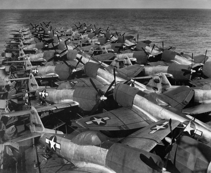 A deckload of U.S. Army Air Force Republic P-47N Thunderbolt fighters on the flight deck of the escort carrier USS Casablanca (CVE-55) in 16 July 1945. The planes were loaded at Naval Air Station Alameda, California (USA) and were bound for Guam.