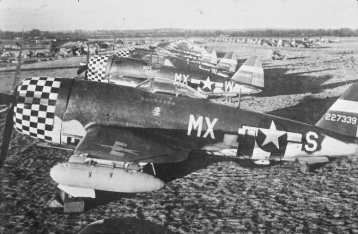 A line of 82nd Fighter Squadron, 78th Fighter Group P-47 Thunderbolts at Duxford airbase.