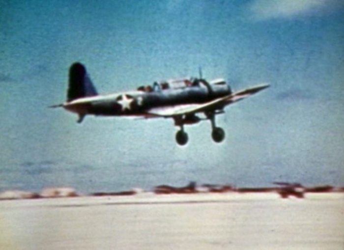 A U.S. Marine Corps Vought SB2U-3 Vindicator dive bomber of Marine scout bombing squadron VMSB-241 taking off from Eastern Island, Midway Atoll, during the Battle of Midway, 4-6 June 1942.