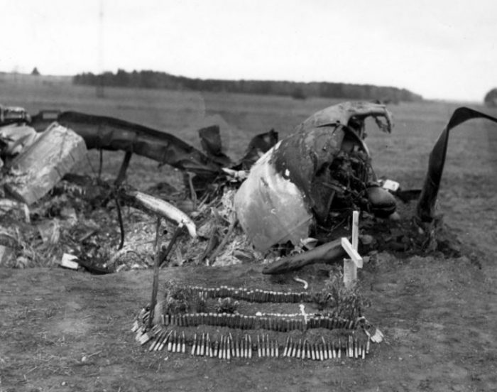 When a squadron of P-47 Thunderbolts attacked a gunpowder storage depot, the ensuing explosion destroyed one of their aircraft. The grave for the pilot was made by a refugee French couple, with .50cal ammunition for a border.