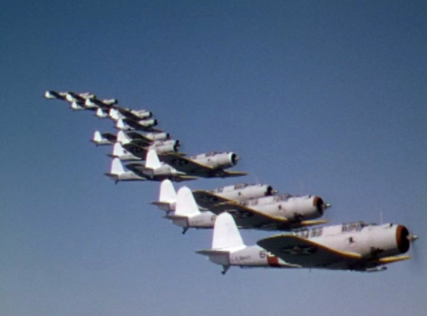 U.S. Navy Vought SB2U Vindicator dive bombers of Bombing Squadron VB-4 High Hatters in formation during the movie Dive Bomber (1941).