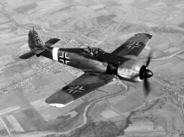 A captured Fw 190A-4. The USAAF-painted Balkenkreuz and swastika markings are of nonstandard size and proportions