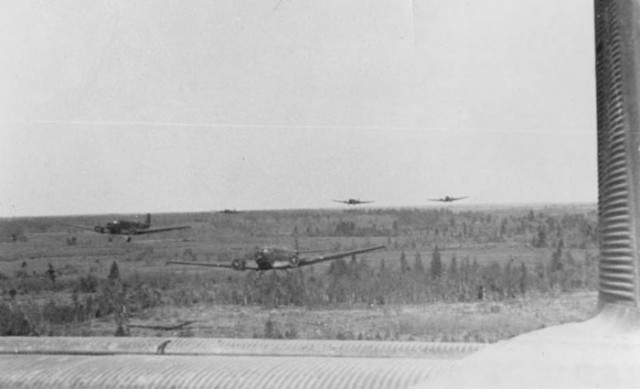 A squadron of Luftwaffe Ju-52 Junkers stream low over the Russian countryside near Demjansk, south of Leningrad.