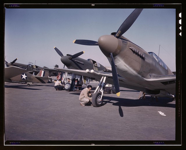 P-51 Mustang fighter planes being prepared for test flight at the field of the North American Aviation, Inc., plant in Inglewood, California.