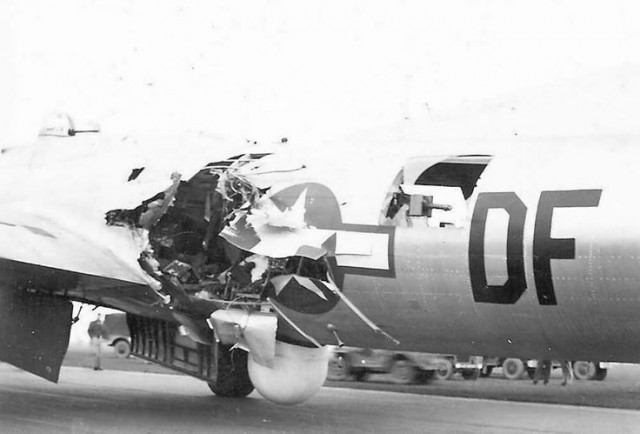 B-17 91 Bomb Group 324 Bomb Squadron with heavy flak damage.