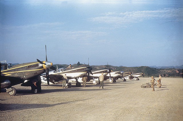P-51B and P-51C Mustang fighters of the US Army Air Force 118th Tactical Recon Squadron at Laohwangping Airfield, Guizhou Province, China, Jun 1945.