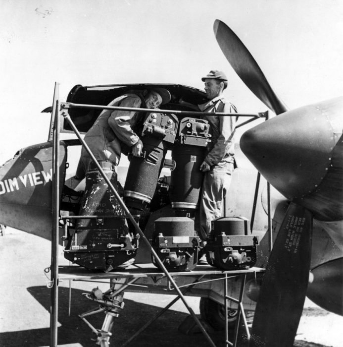 Engineers fit cameras into a reconnaissance variant of the P-38