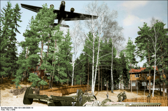 Messerschmitt Bf 110 of future night fighter ace Lt. Helmut Lent overshoot the runway in Oslo-Fornebu and came to rest in the garden of a house. A Junkers Ju 52/3m plane flies over the location. The photo has been taken by war reporters of the 5th Luftwaffe in Oslo1940.Photo: Pilz CC BY-SA 4.0