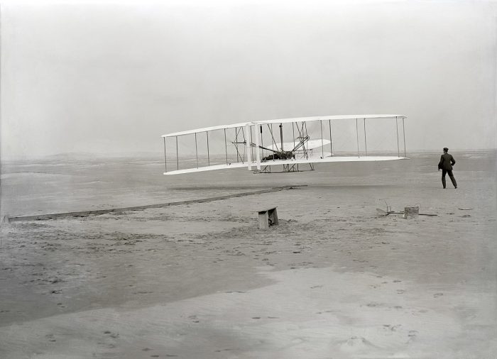 The famous shot of the Wright brother’s successful first flight. It wouldn’t be long however before its military use was considered.