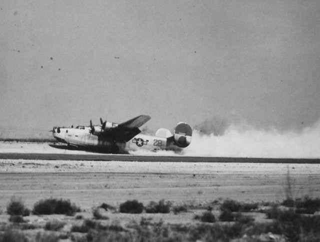 “T’ings Is Tuff”, the Douglas-Tulsa-built Consolidated B-24H-15-DT Liberator, s/n 41-28931, 724th Bomb Squadron, 451st Bomb Group, 15th Air Force making a belly-landing at its base in Apulia Southern Italy after being damaged by Flak on a mission to Ploesti/Romania
