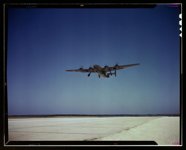 A C-87 transport plane takes off on test flight, Consolidated Aircraft Corp., Fort Worth, Texas