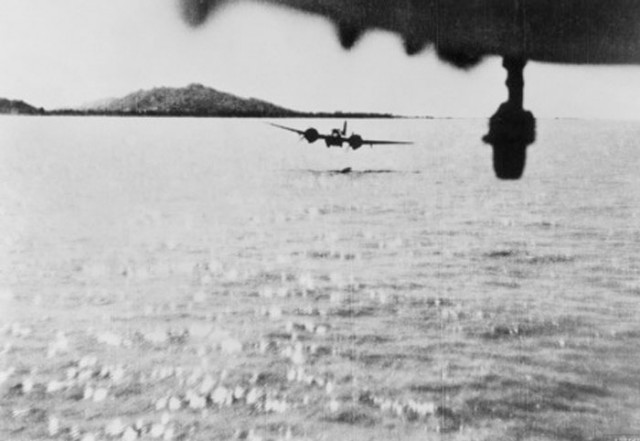 Blenheim aircraft from 60 Squadron RAF level out for the “run in” to make a mast-head attack on a Japanese coaster off Akyab, Burms in 1942