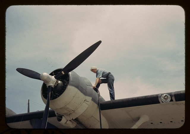 Sailor mechanic fuelling a plane at the Naval Air Base, Corpus Christi, Texas.