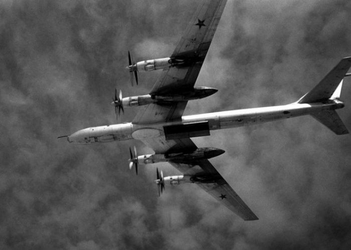 Underside of a Soviet Tu-95 “Bear F” with an open weapons bay over the Pacific in 1987.