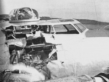 A ground-launched rocket missile caused this damage to 388BG’s “Panhandle” during an attack on a V-weapon site, June 15, 1944. The missile struck number 3 engine, ricocheted into the fuselage and exploded, leaving Sgt Biggs, the top turret gunner, with nasty burns. Despite extensive damage to various control lines, Lt McFarlane brought the bomber down safely at Manston.
