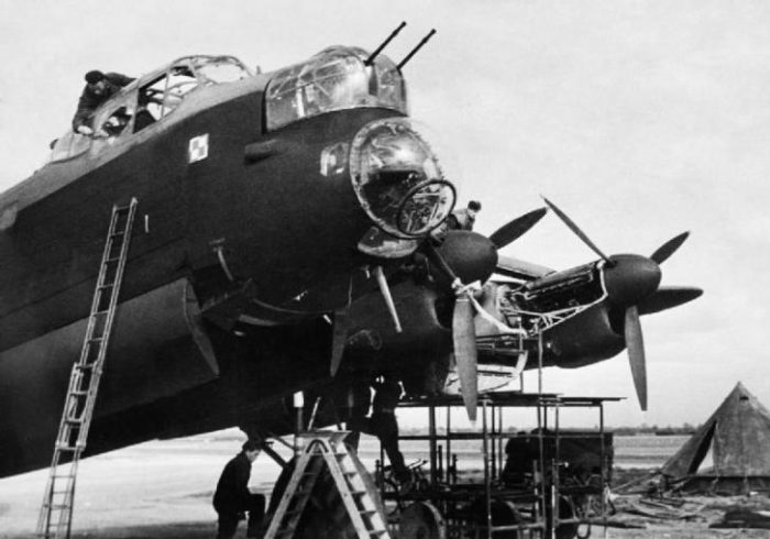 Ground crew servicing an Avro Lancaster of No 300 Polish Bomber Squadron RAF at Faldingworth, Lincolnshire