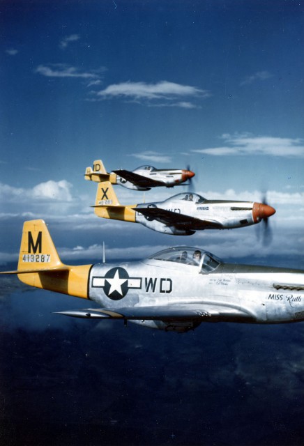 P-51D Mustangs of the 4th Fighter Squadron in flight, Italy, 1944