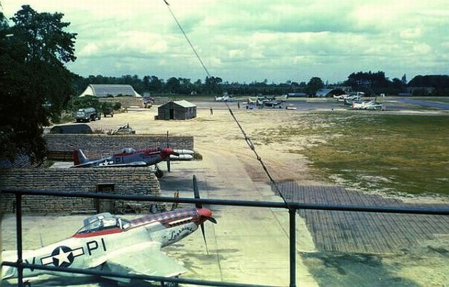 View from the control tower at Martlesham Heath, Suffolk, England, UK, of P-51D Mustangs of the 360th Fighter Squadron in sandbag revetments, 1944.